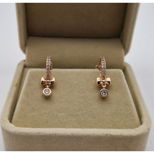 Antiallergén lógós masni fülbevaló